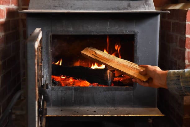 Wood burning stove in home